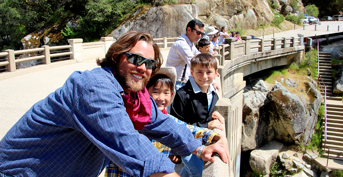 4th & 5th grade teacher Craig Kellogg with students during a field trip to the Sierras.