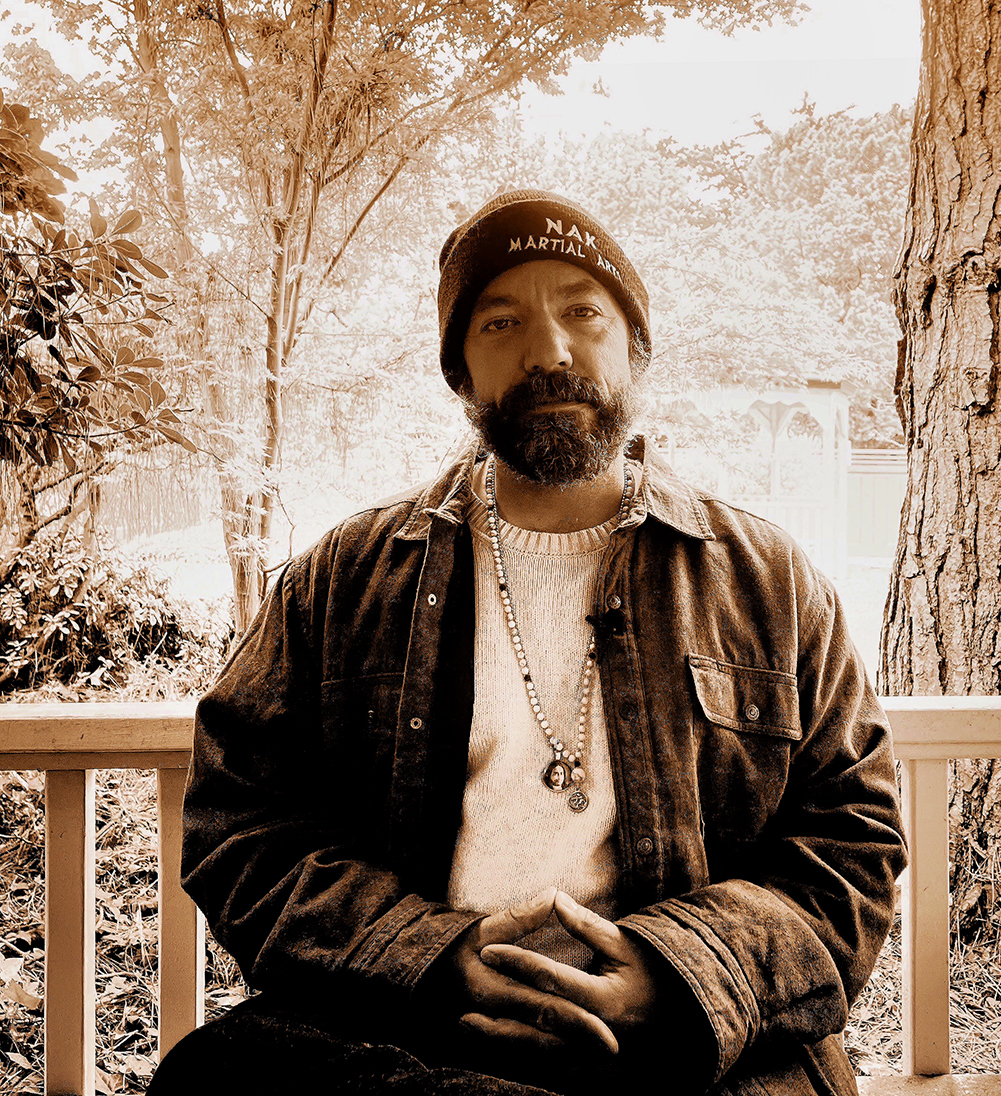 Martial artist David Hardin James relaxes while waiting to be interviewed