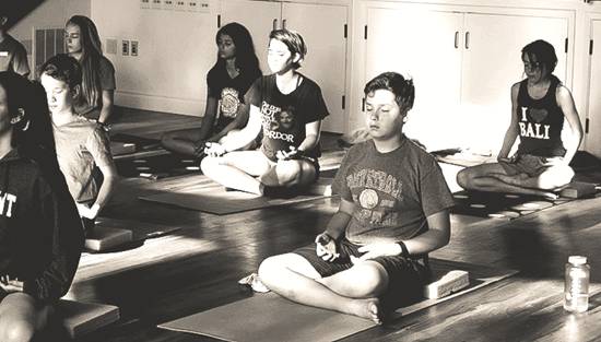 Students meditating at Living Wisdom High School of Palo Alto, California.