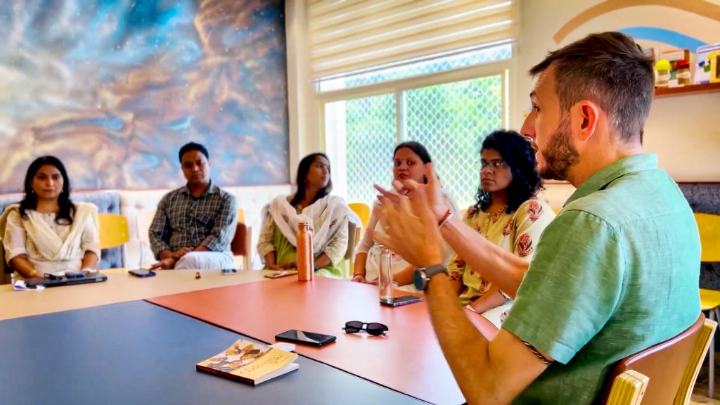 Aryavan McSweeney, director of Living Wisdom School in Palo Alto, California, talks about Education for Life principles and methods with teachers at a DLF Foundation sponsored school in Gurugram, India.