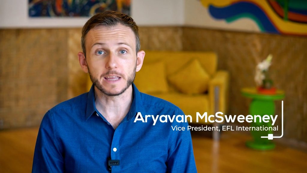 Video screenshot showing Aryavan McSweeney, director of Living Wisdom School of Palo Alto, California